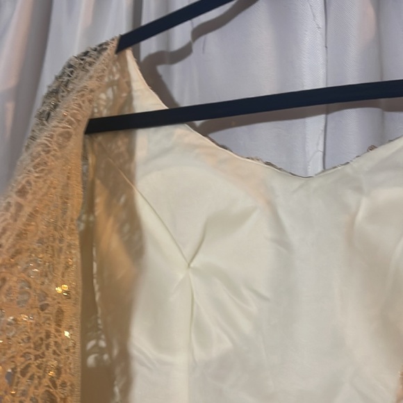 New with tags cream evening gown with champagne gold sequined overlay lace. - Picture 8 of 13